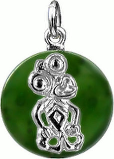 Tiki on Nephrite Disc